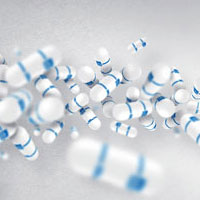 Use Illustrator and Photoshop to Create a 3D String of Pills - Screencast